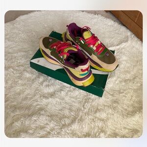 Men size 11 colorful nice sneakers.  Excellent condition.